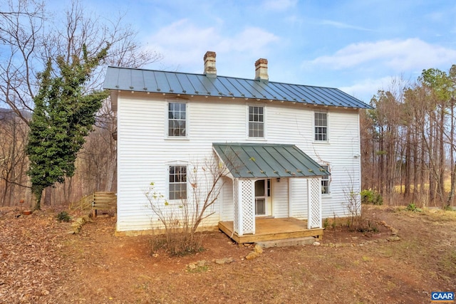 view of front of house featuring a wooden deck