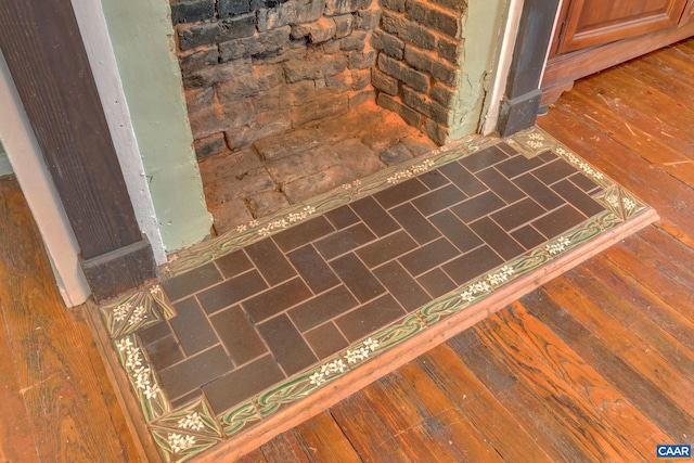 details with wood-type flooring