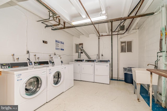 washroom with separate washer and dryer