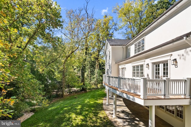 view of yard with a deck