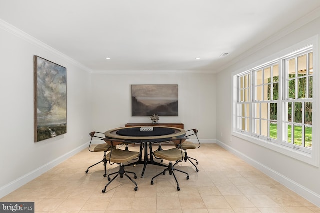 dining area featuring a healthy amount of sunlight, light tile patterned flooring, and ornamental molding