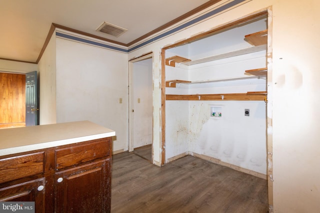 laundry room with dark hardwood / wood-style floors, hookup for an electric dryer, and washer hookup