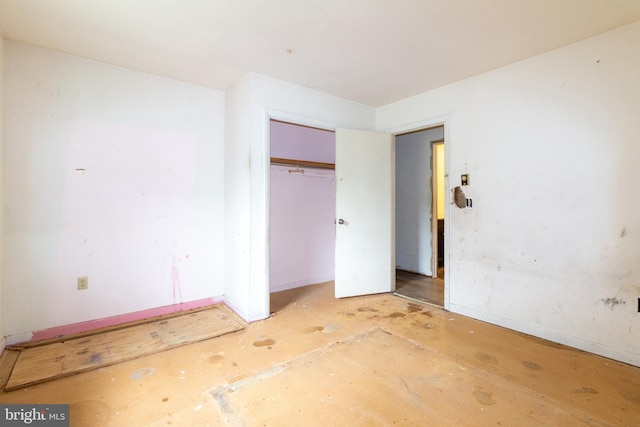 unfurnished bedroom featuring a closet