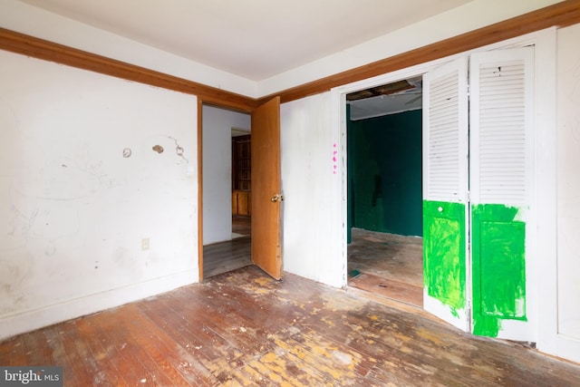 spare room featuring hardwood / wood-style flooring