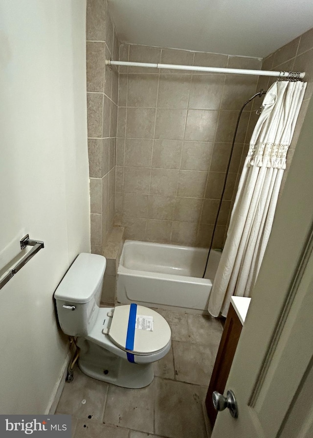 full bathroom with tile patterned floors, vanity, toilet, and shower / bathtub combination with curtain