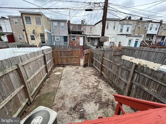 view of yard featuring central air condition unit