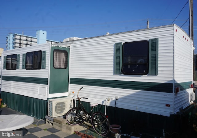 view of property exterior featuring ac unit