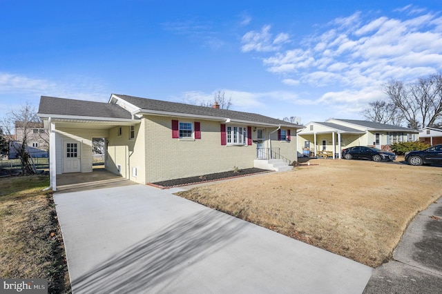 single story home featuring a carport