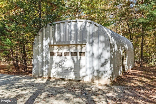 view of outdoor structure with a garage