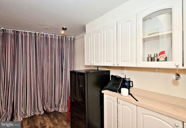 washroom featuring dark hardwood / wood-style floors