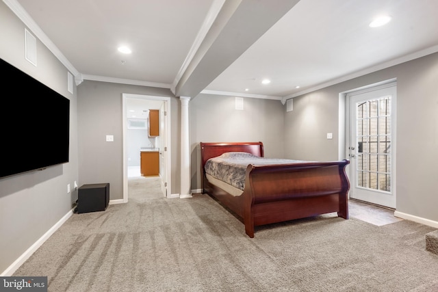 carpeted bedroom with access to outside and ornamental molding