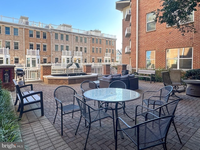 view of patio / terrace with a balcony