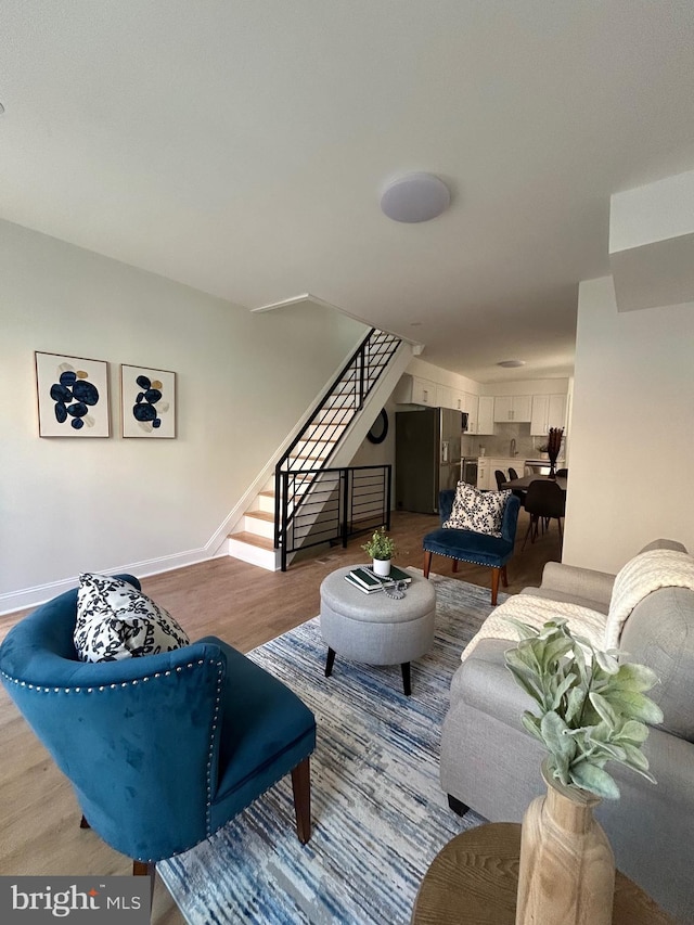 living room with hardwood / wood-style flooring