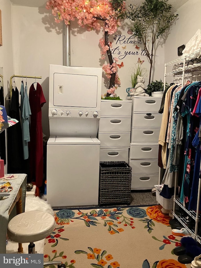 interior space with stacked washer / dryer