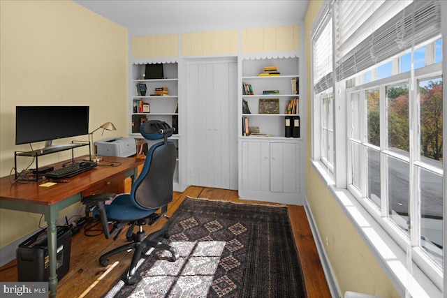 office area with wood-type flooring