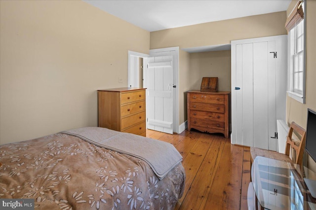 bedroom featuring light wood-type flooring