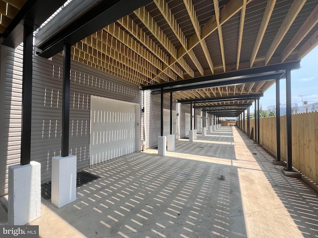 view of patio featuring a garage