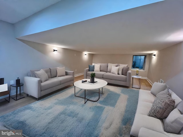 living room with light hardwood / wood-style flooring