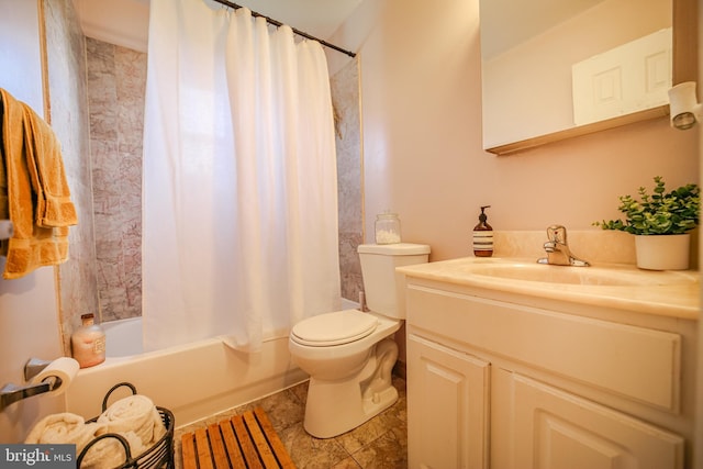 full bathroom with shower / bath combination with curtain, vanity, and toilet