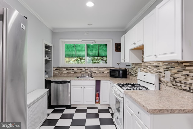 kitchen with white cabinetry, crown molding, stainless steel appliances, and sink