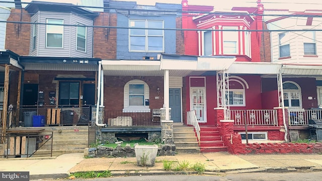 multi unit property featuring covered porch