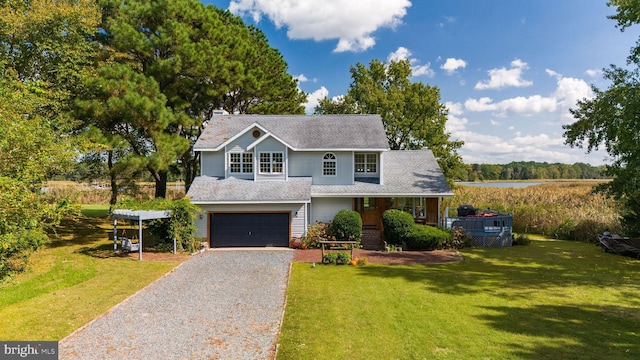 view of front facade with a garage and a front yard