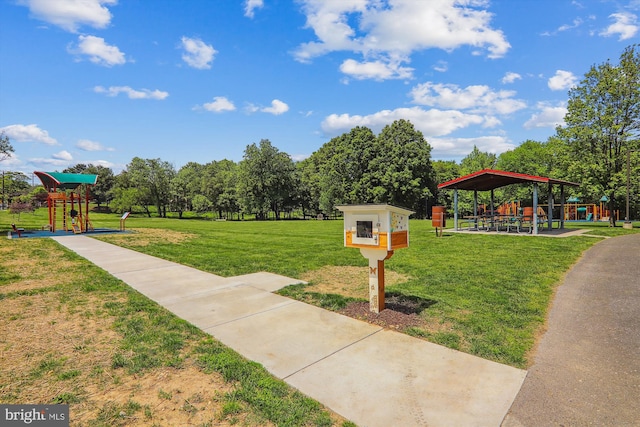 view of property's community with a gazebo, a yard, and a playground