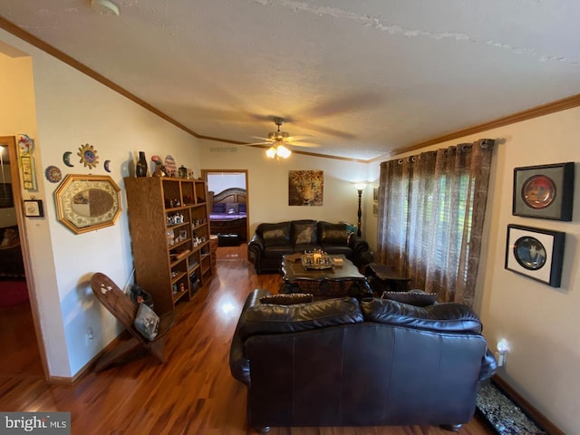 living room featuring a textured ceiling, crown molding, dark hardwood / wood-style flooring, and ceiling fan