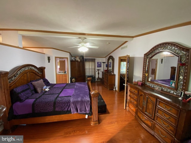 bedroom featuring light hardwood / wood-style flooring, vaulted ceiling, ceiling fan, and crown molding