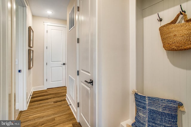 corridor featuring hardwood / wood-style flooring