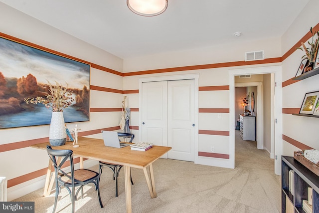 home office with light colored carpet