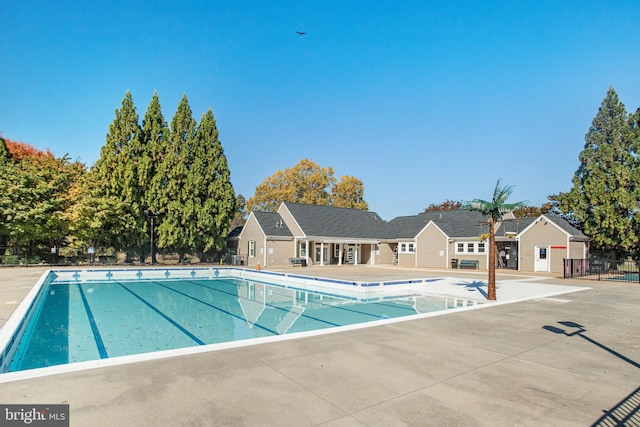 view of swimming pool with a patio area