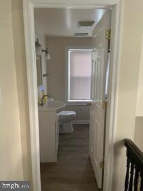 2826 Hoopers Island Rd, Church Creek, MD 21622 - hall featuring dark wood finished floors