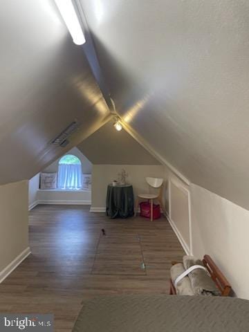 2826 Hoopers Island Rd, Church Creek, MD 21622 - additional living space featuring lofted ceiling, wood finished floors, and baseboards