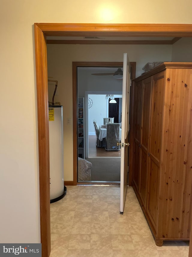 2826 Hoopers Island Rd, Church Creek, MD 21622 - hall with gas water heater and light floors