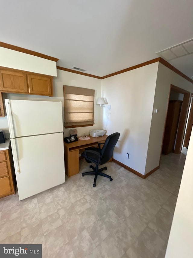 home office with ornamental molding