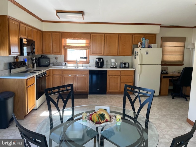 2826 Hoopers Island Rd, Church Creek, MD 21622 - kitchen with brown cabinetry, light countertops, black appliances, a sink, and crown molding