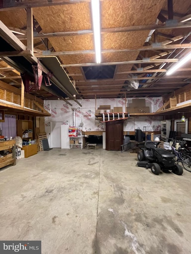 garage featuring a workshop area