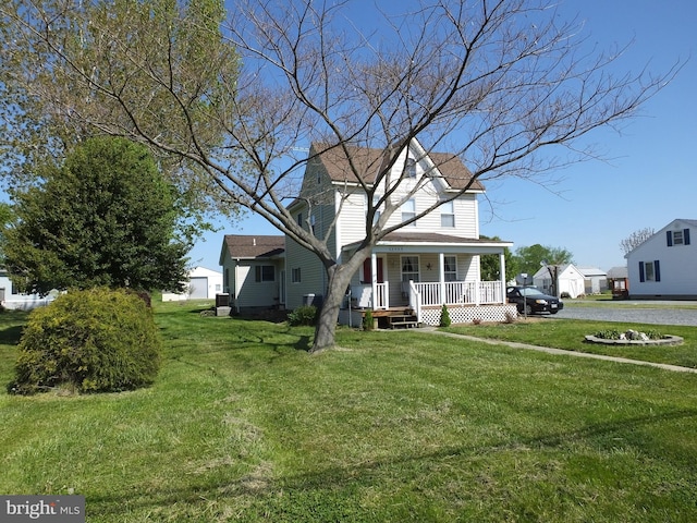 2826 Hoopers Island Rd, Church Creek, MD 21622 - view of front of property with covered porch and a front yard