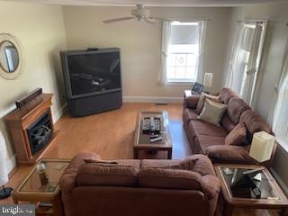 living room with ceiling fan