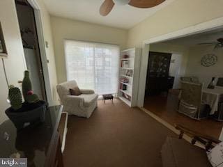 2826 Hoopers Island Rd, Church Creek, MD 21622 - living area with a ceiling fan and carpet