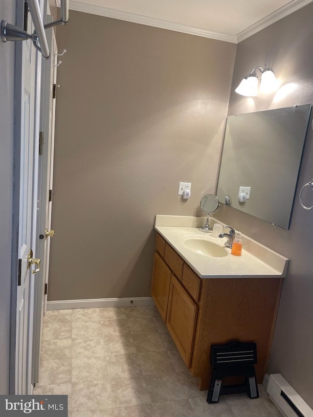 bathroom featuring vanity, a baseboard heating unit, and ornamental molding