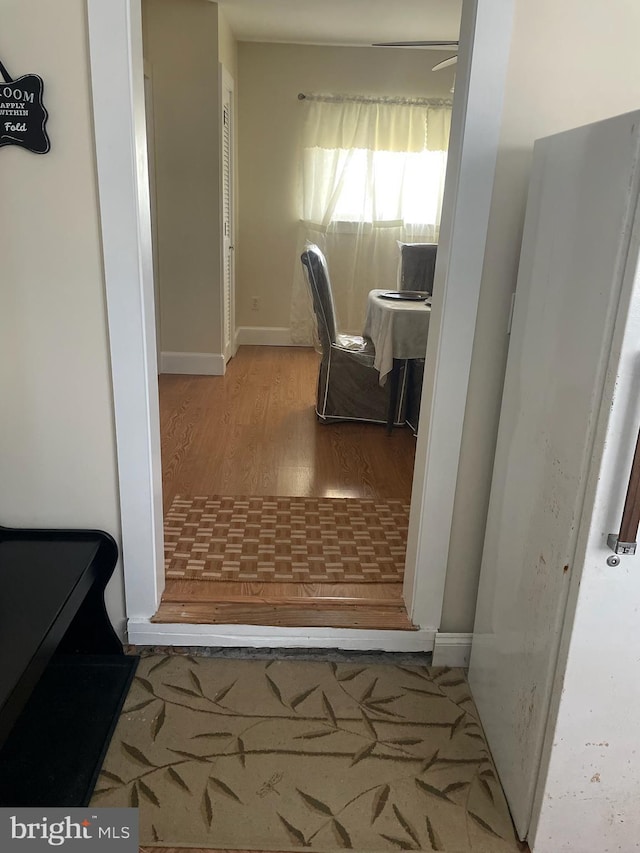 2826 Hoopers Island Rd, Church Creek, MD 21622 - hallway featuring baseboards and wood finished floors