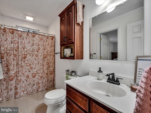 bathroom with vanity, toilet, and a shower with curtain