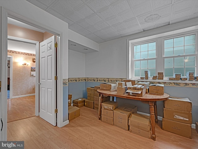 office space with light wood-type flooring