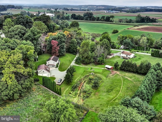 birds eye view of property featuring a rural view