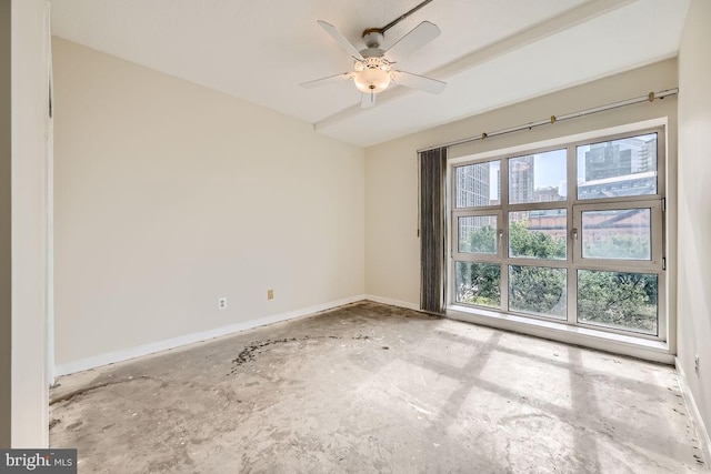 empty room featuring ceiling fan