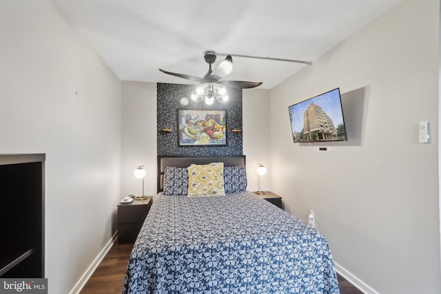 bedroom featuring hardwood / wood-style flooring and ceiling fan