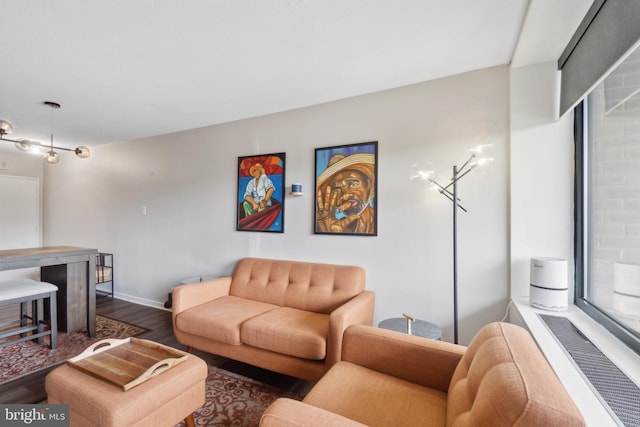 living room with dark hardwood / wood-style floors