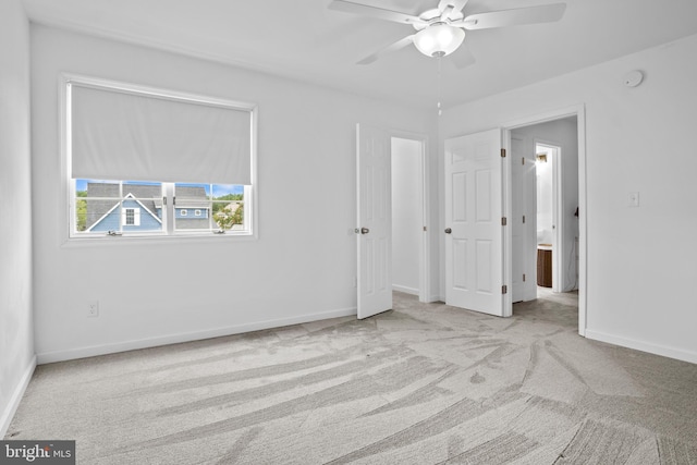 unfurnished bedroom with light carpet and ceiling fan